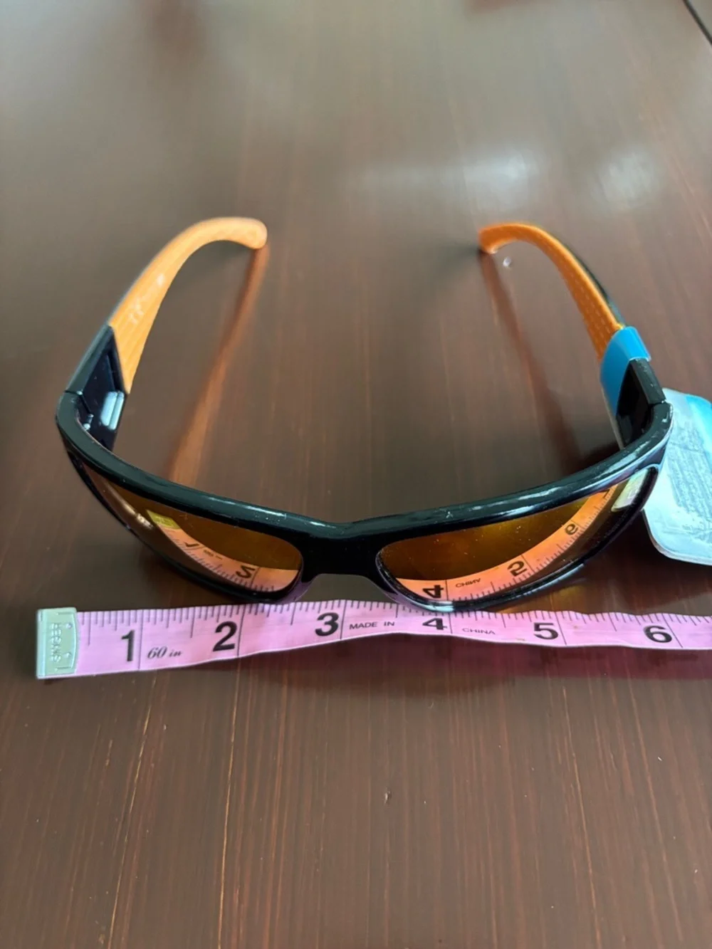 Foster Grant 100% UVA-UVB protect,black frame,rainbow mirror lens, rubber temple